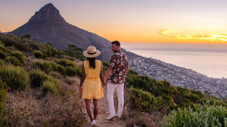 Romantic sunset stroll on Signal Hill with view of Lion's Head and the sea, THREE43 on B